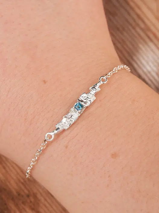 modern jewellery silver bracelet featuring a gemstone