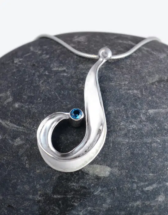 handmade sterling silver pendant with choice of gemstone set in a swirl. Made by Zoe Davidson, Stromness, Orkney, Scotland