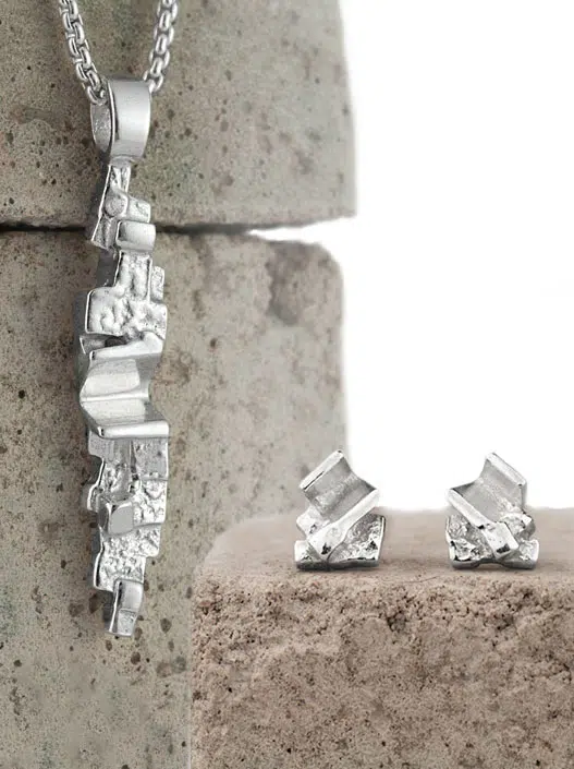 designer jewllery set including sterling silver pendant and earrings. Design inspired by the Churchill Barriers, Orkney.