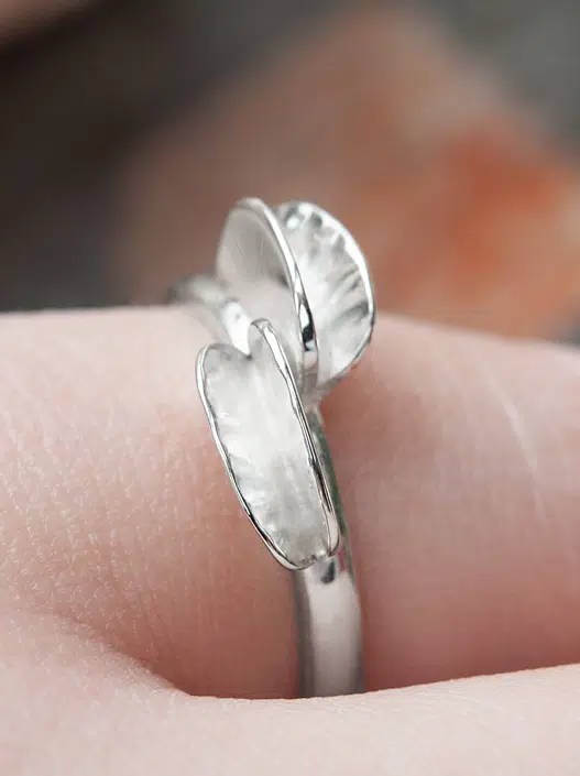 silver unusual wave like formed ring